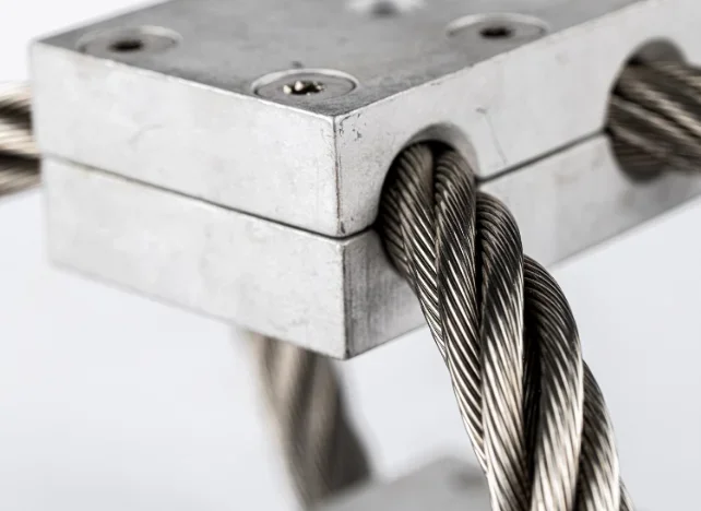 Closeup wire rope mount.